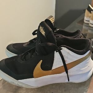 Nike Black and White Hustle Sneakers